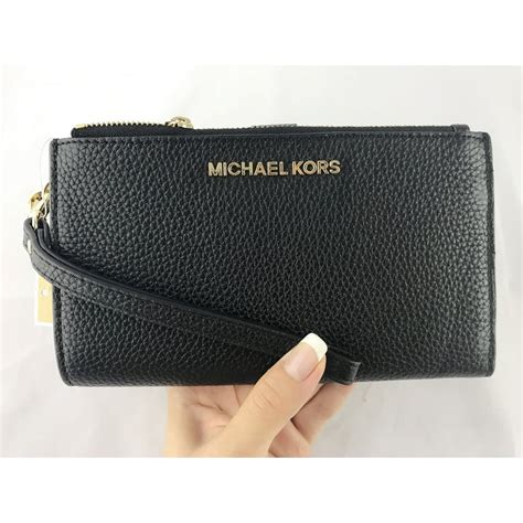 black michael kors jet set wallet|Michael Kors wristlet jet set.